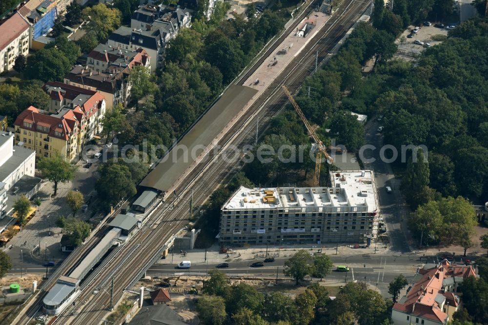 Berlin from the bird's eye view: New construction comany Mark-A. Krueger Bauunternehmung GmbH of the building complex of the shopping center Treskowallee - Am Carlsgarten on city- train station Karlshorst in Berlin