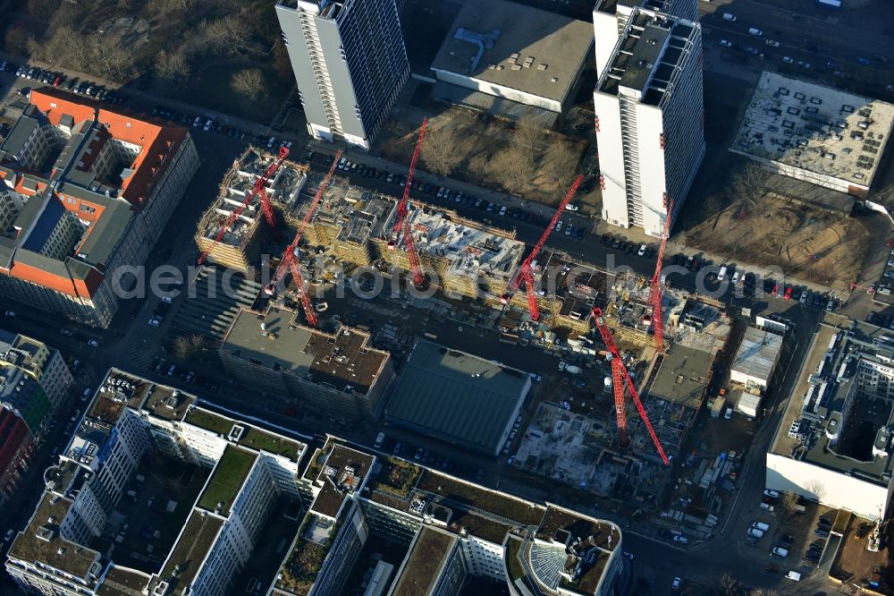 Berlin from the bird's eye view: Constuction site Markgrafenkarree in the Krausenstrasse / Jerusalemer Strasse in Berlin. The building was commissioned by the Axel Springer AG and implemented by the architects Thomas Mueller, Ivan Reimann and Stefan Forster