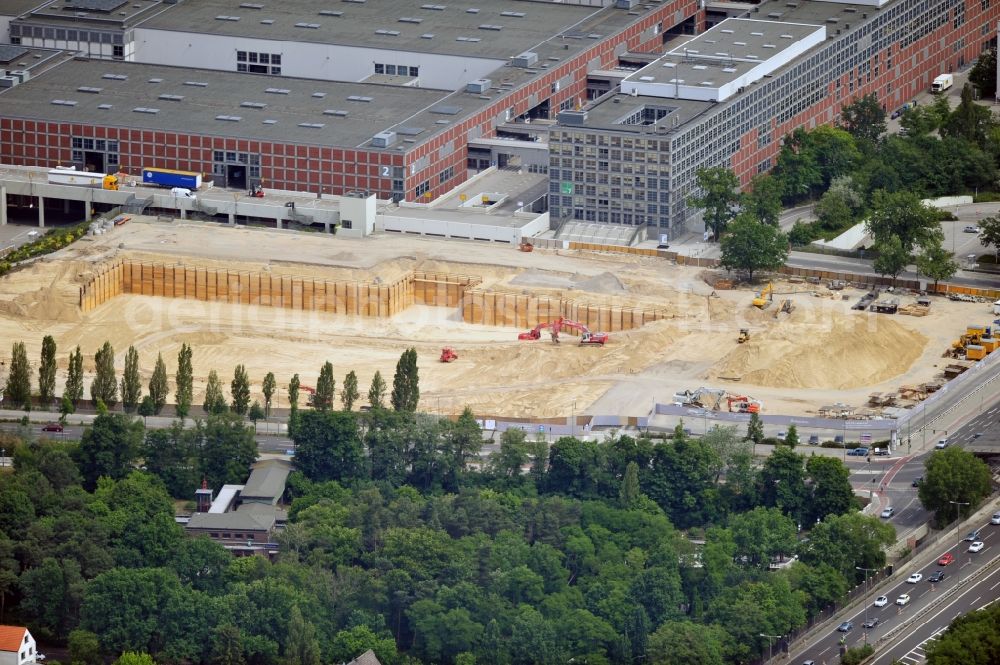 Aerial photograph Berlin - View of construction site at the exhibition venue Cube City Exhibition Grounds in Berlin Charlottenburg. On the site of the demolished Germany Hall is to be completed by the end of 2013, designed by the architectural firm UNIQUE CODE suitable congress hall