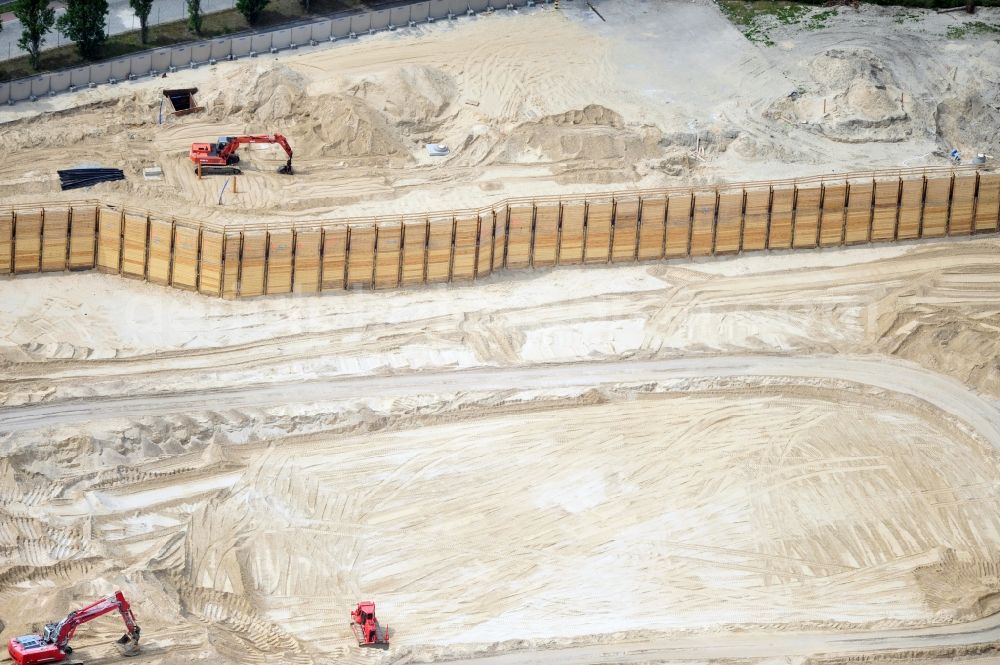 Berlin from the bird's eye view: View of construction site at the exhibition venue Cube City Exhibition Grounds in Berlin Charlottenburg. On the site of the demolished Germany Hall is to be completed by the end of 2013, designed by the architectural firm UNIQUE CODE suitable congress hall