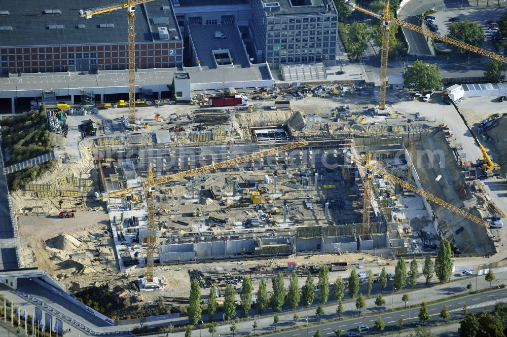 Berlin from the bird's eye view: View of construction site at the exhibition venue Cube City Exhibition Grounds in Berlin Charlottenburg. On the site of the demolished Germany Hall is to be completed by the end of 2013, designed by the architectural firm UNIQUE CODE suitable congress hall