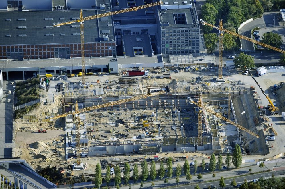 Aerial image Berlin - View of construction site at the exhibition venue Cube City Exhibition Grounds in Berlin Charlottenburg. On the site of the demolished Germany Hall is to be completed by the end of 2013, designed by the architectural firm UNIQUE CODE suitable congress hall