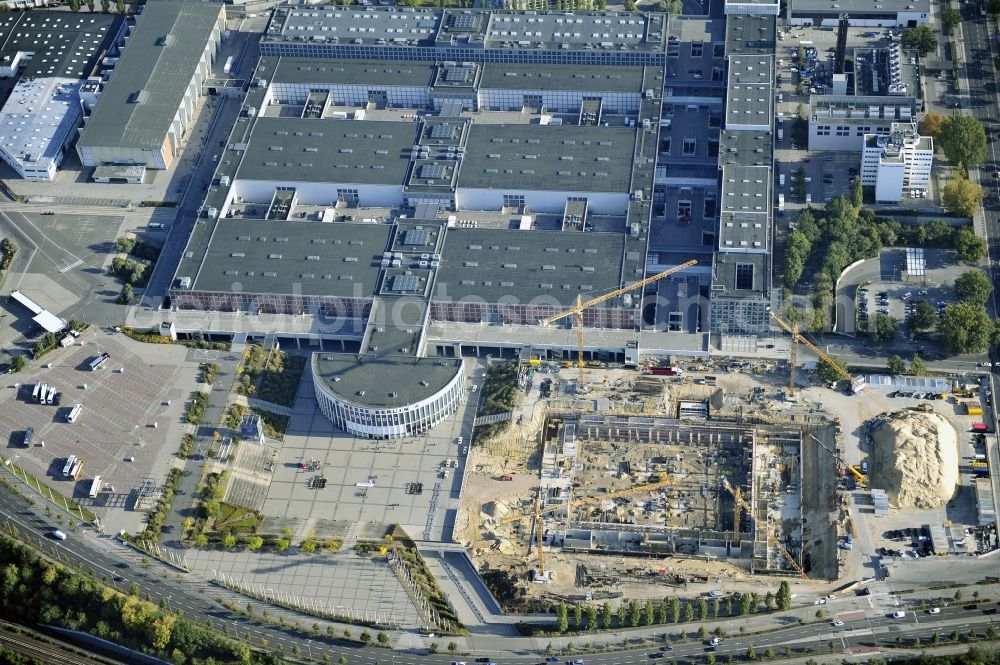 Aerial image Berlin - View of construction site at the exhibition venue Cube City Exhibition Grounds in Berlin Charlottenburg. On the site of the demolished Germany Hall is to be completed by the end of 2013, designed by the architectural firm UNIQUE CODE suitable congress hall