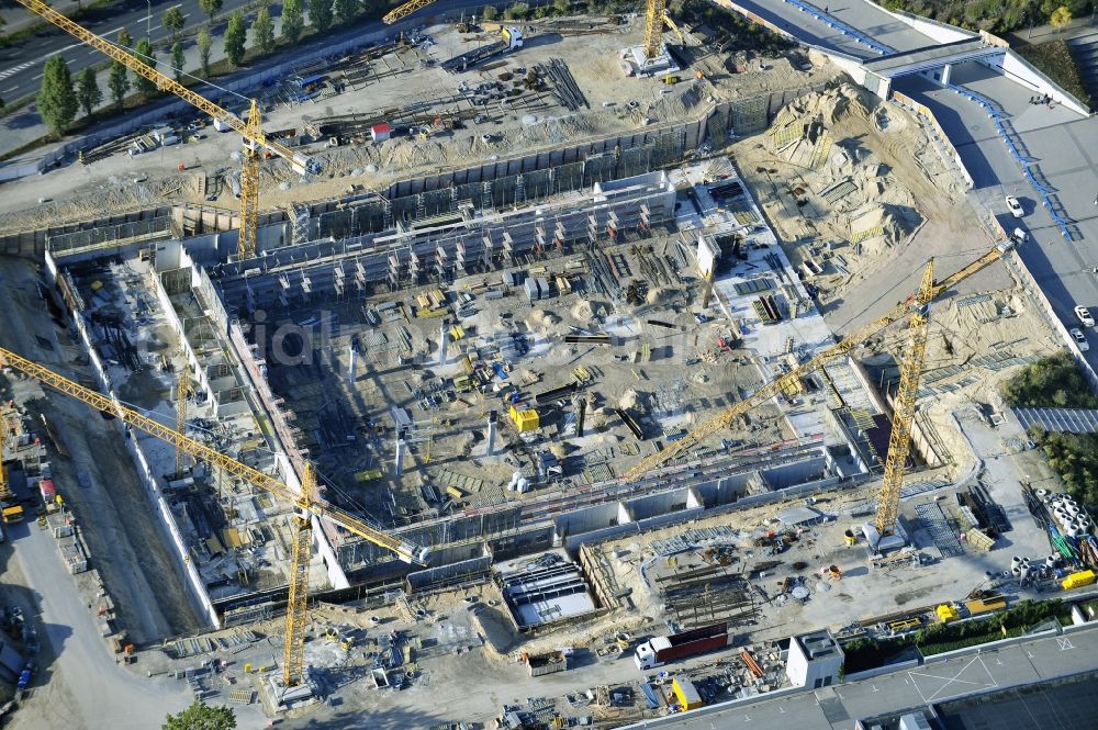 Aerial photograph Berlin - View of construction site at the exhibition venue Cube City Exhibition Grounds in Berlin Charlottenburg. On the site of the demolished Germany Hall is to be completed by the end of 2013, designed by the architectural firm UNIQUE CODE suitable congress hall