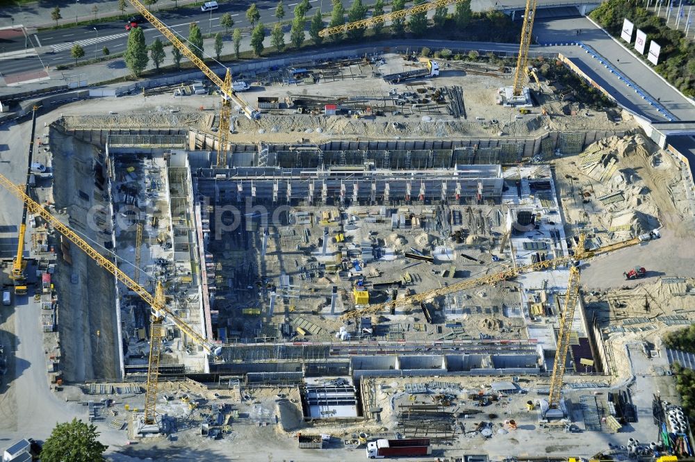 Berlin from above - View of construction site at the exhibition venue Cube City Exhibition Grounds in Berlin Charlottenburg. On the site of the demolished Germany Hall is to be completed by the end of 2013, designed by the architectural firm UNIQUE CODE suitable congress hall