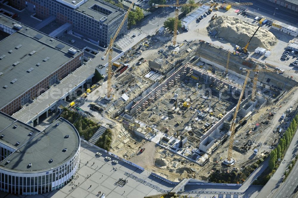 Aerial photograph Berlin - View of construction site at the exhibition venue Cube City Exhibition Grounds in Berlin Charlottenburg. On the site of the demolished Germany Hall is to be completed by the end of 2013, designed by the architectural firm UNIQUE CODE suitable congress hall