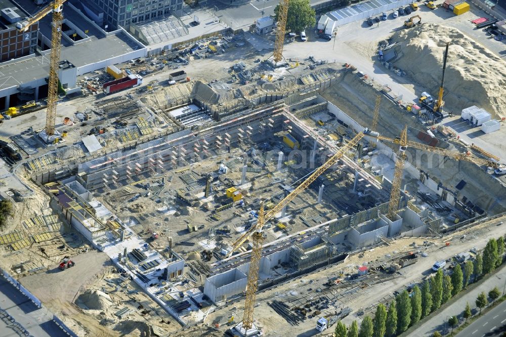 Berlin from the bird's eye view: View of construction site at the exhibition venue Cube City Exhibition Grounds in Berlin Charlottenburg. On the site of the demolished Germany Hall is to be completed by the end of 2013, designed by the architectural firm UNIQUE CODE suitable congress hall