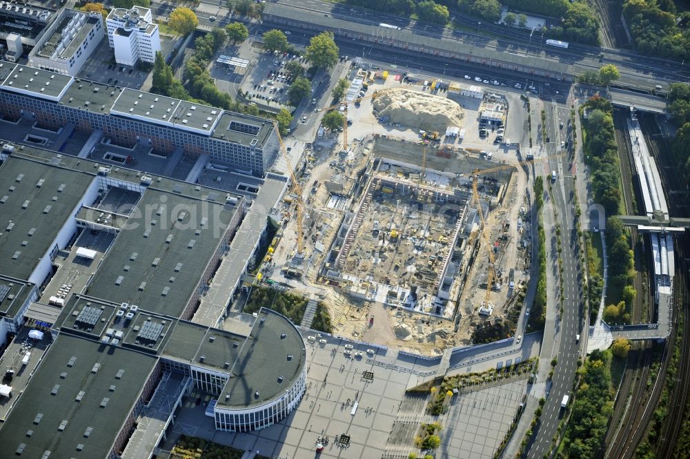 Berlin from the bird's eye view: View of construction site at the exhibition venue Cube City Exhibition Grounds in Berlin Charlottenburg. On the site of the demolished Germany Hall is to be completed by the end of 2013, designed by the architectural firm UNIQUE CODE suitable congress hall