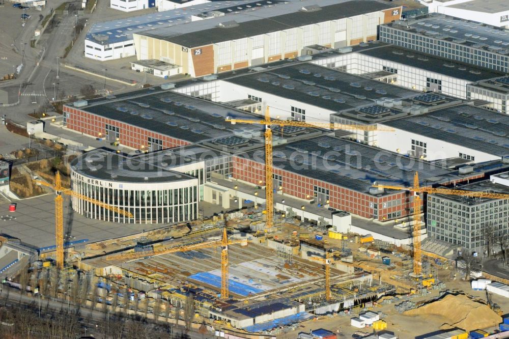 Berlin from the bird's eye view: View of construction site at the exhibition venue Cube City Exhibition Grounds in Berlin Charlottenburg. On the site of the demolished Germany Hall is to be completed by the end of 2013, designed by the architectural firm UNIQUE CODE suitable congress hall