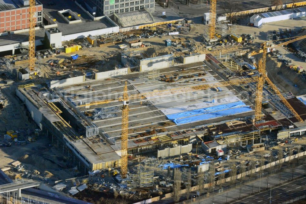 Berlin from the bird's eye view: View of construction site at the exhibition venue Cube City Exhibition Grounds in Berlin Charlottenburg. On the site of the demolished Germany Hall is to be completed by the end of 2013, designed by the architectural firm UNIQUE CODE suitable congress hall