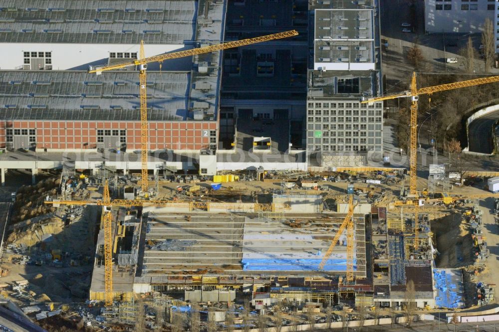 Aerial photograph Berlin - View of construction site at the exhibition venue Cube City Exhibition Grounds in Berlin Charlottenburg. On the site of the demolished Germany Hall is to be completed by the end of 2013, designed by the architectural firm UNIQUE CODE suitable congress hall