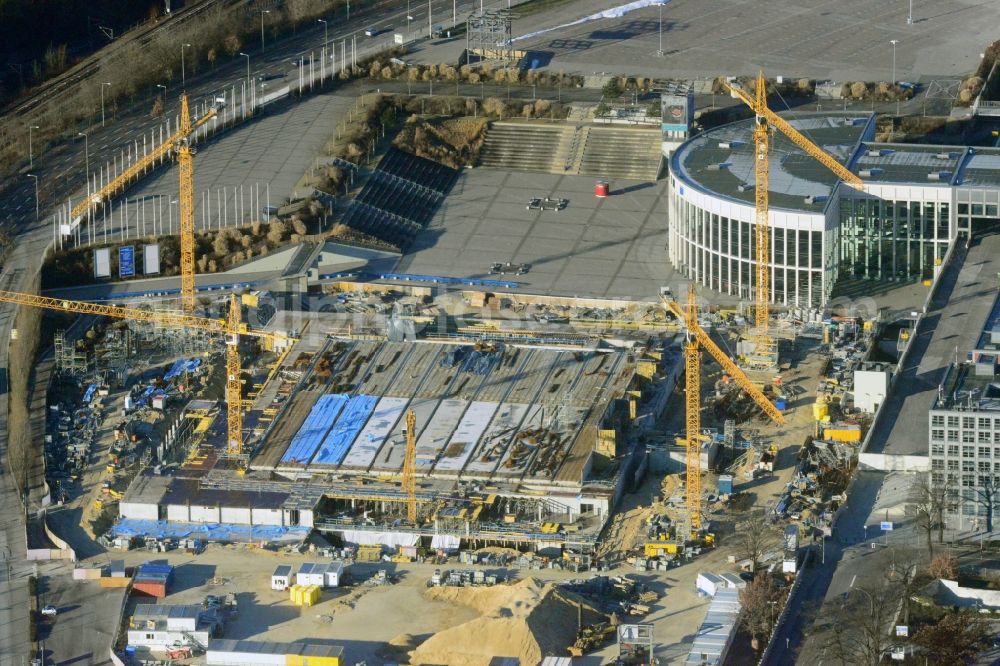 Berlin from the bird's eye view: View of construction site at the exhibition venue Cube City Exhibition Grounds in Berlin Charlottenburg. On the site of the demolished Germany Hall is to be completed by the end of 2013, designed by the architectural firm UNIQUE CODE suitable congress hall