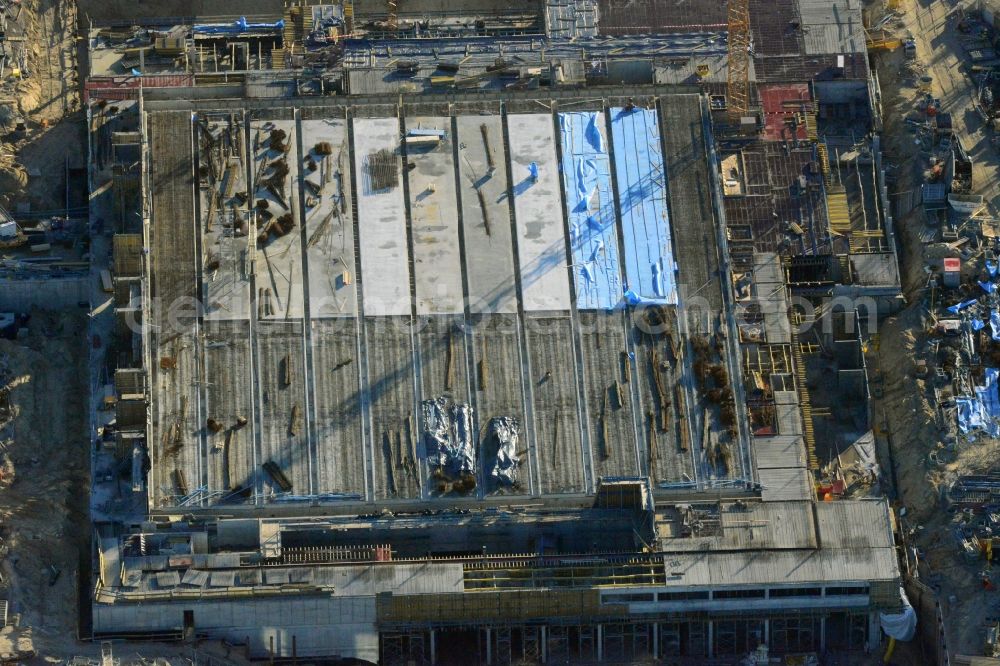 Aerial photograph Berlin - View of construction site at the exhibition venue Cube City Exhibition Grounds in Berlin Charlottenburg. On the site of the demolished Germany Hall is to be completed by the end of 2013, designed by the architectural firm UNIQUE CODE suitable congress hall