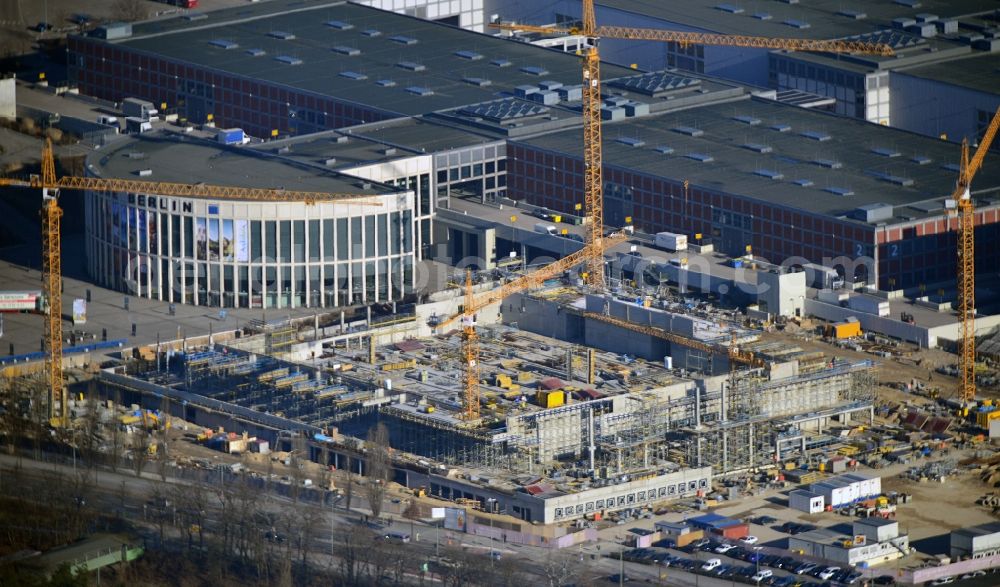 Aerial photograph Berlin - View of construction site at the exhibition venue Cube City Exhibition Grounds in Berlin Charlottenburg. On the site of the demolished Germany Hall is to be completed by the end of 2013, designed by the architectural firm UNIQUE CODE suitable congress hall