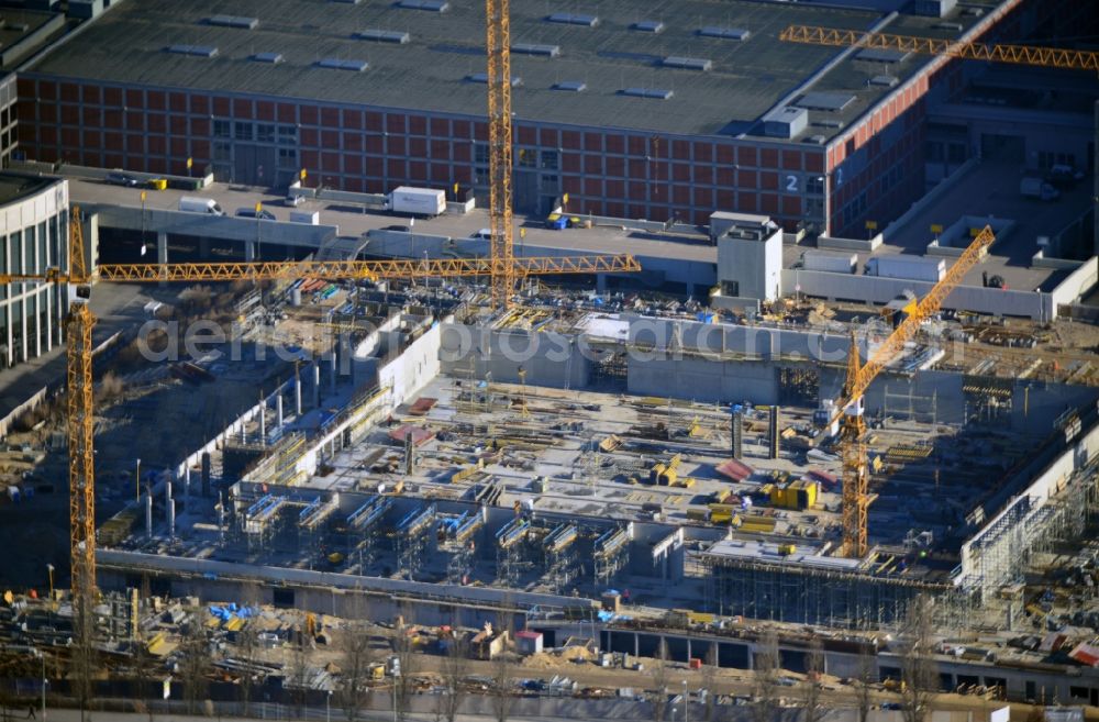 Berlin from above - View of construction site at the exhibition venue Cube City Exhibition Grounds in Berlin Charlottenburg. On the site of the demolished Germany Hall is to be completed by the end of 2013, designed by the architectural firm UNIQUE CODE suitable congress hall