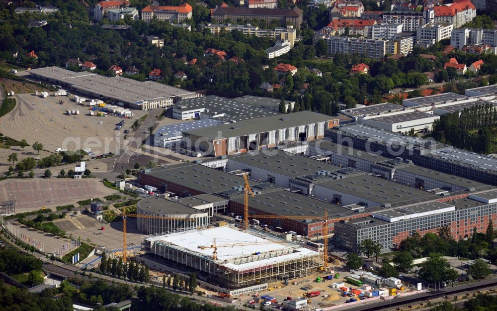 Berlin from above - View of construction site at the exhibition venue Cube City Exhibition Grounds in Berlin Charlottenburg. On the site of the demolished Germany Hall is to be completed by the end of 2013, designed by the architectural firm UNIQUE CODE suitable congress hall