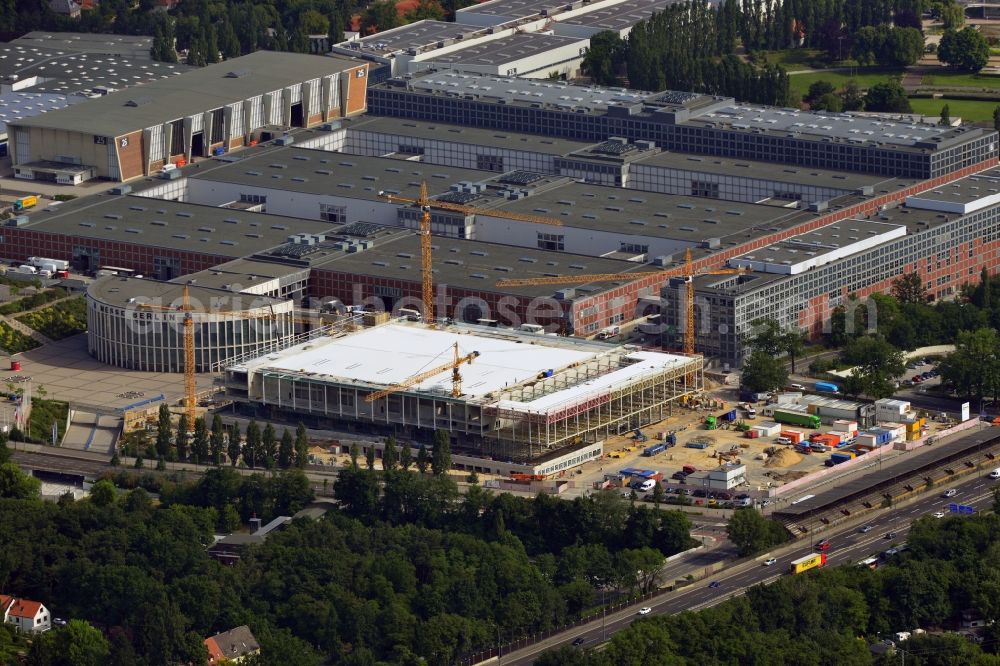 Aerial image Berlin - View of construction site at the exhibition venue Cube City Exhibition Grounds in Berlin Charlottenburg. On the site of the demolished Germany Hall is to be completed by the end of 2013, designed by the architectural firm UNIQUE CODE suitable congress hall