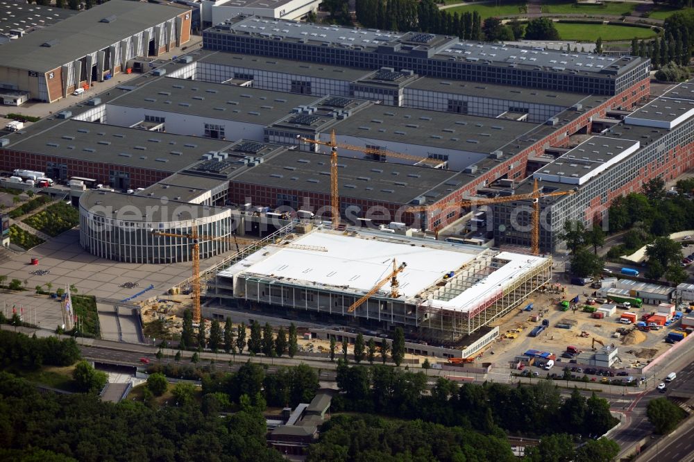 Aerial photograph Berlin - View of construction site at the exhibition venue Cube City Exhibition Grounds in Berlin Charlottenburg. On the site of the demolished Germany Hall is to be completed by the end of 2013, designed by the architectural firm UNIQUE CODE suitable congress hall