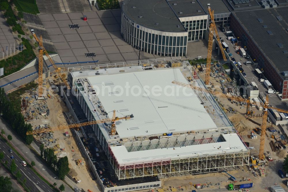 Aerial photograph Berlin - View of construction site at the exhibition venue Cube City Exhibition Grounds in Berlin Charlottenburg. On the site of the demolished Germany Hall is to be completed by the end of 2013, designed by the architectural firm UNIQUE CODE suitable congress hall