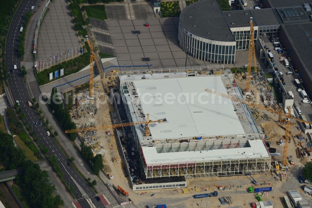 Berlin from above - View of construction site at the exhibition venue Cube City Exhibition Grounds in Berlin Charlottenburg. On the site of the demolished Germany Hall is to be completed by the end of 2013, designed by the architectural firm UNIQUE CODE suitable congress hall