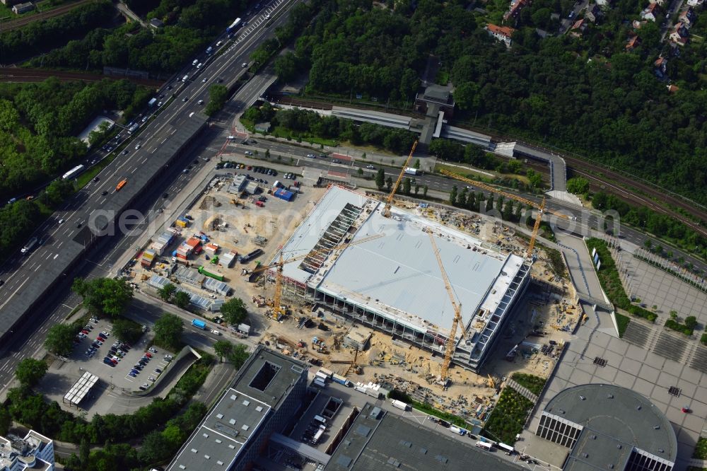 Berlin from the bird's eye view: View of construction site at the exhibition venue Cube City Exhibition Grounds in Berlin Charlottenburg. On the site of the demolished Germany Hall is to be completed by the end of 2013, designed by the architectural firm UNIQUE CODE suitable congress hall