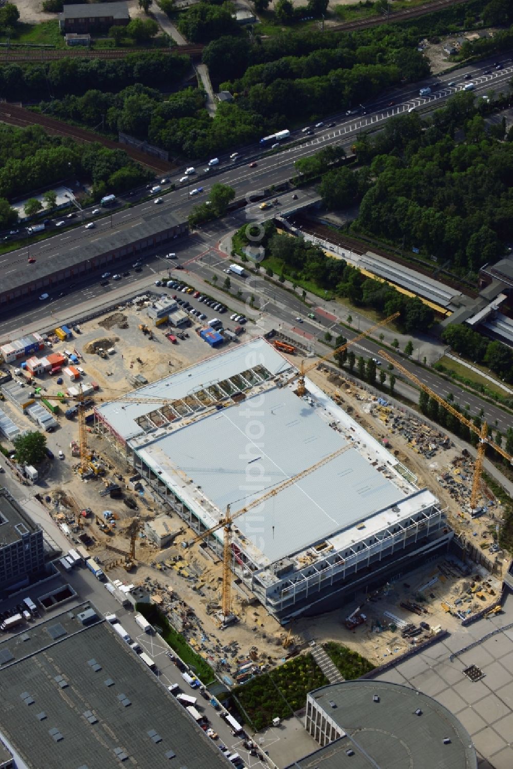 Aerial image Berlin - View of construction site at the exhibition venue Cube City Exhibition Grounds in Berlin Charlottenburg. On the site of the demolished Germany Hall is to be completed by the end of 2013, designed by the architectural firm UNIQUE CODE suitable congress hall