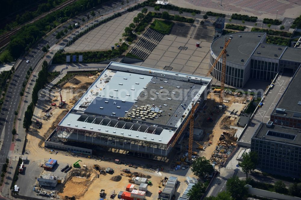 Berlin from above - View of construction site at the exhibition venue Cube City Exhibition Grounds in Berlin Charlottenburg. On the site of the demolished Germany Hall is to be completed by the end of 2013, designed by the architectural firm UNIQUE CODE suitable congress hall