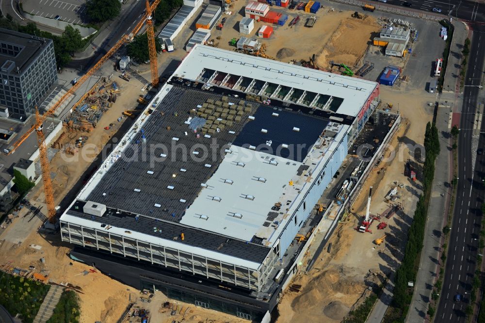 Aerial photograph Berlin - View of construction site at the exhibition venue Cube City Exhibition Grounds in Berlin Charlottenburg. On the site of the demolished Germany Hall is to be completed by the end of 2013, designed by the architectural firm UNIQUE CODE suitable congress hall