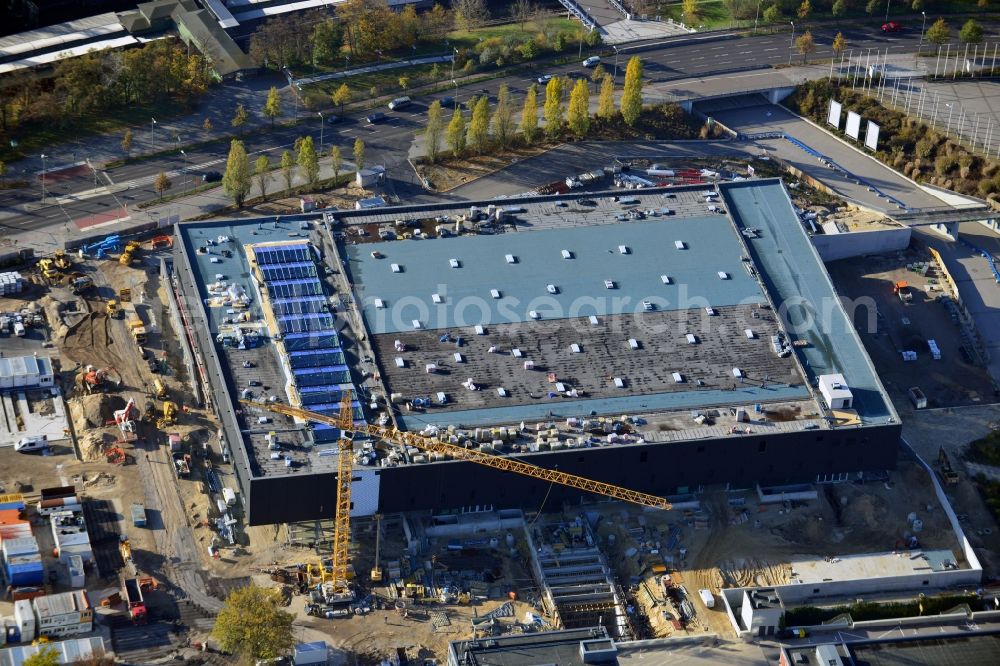 Berlin from the bird's eye view: View of construction site at the exhibition venue Cube City Exhibition Grounds in Berlin Charlottenburg. On the site of the demolished Germany Hall is to be completed by the end of 2013, designed by the architectural firm UNIQUE CODE suitable congress hall