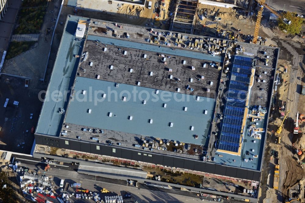 Aerial image Berlin - View of construction site at the exhibition venue Cube City Exhibition Grounds in Berlin Charlottenburg. On the site of the demolished Germany Hall is to be completed by the end of 2013, designed by the architectural firm UNIQUE CODE suitable congress hall