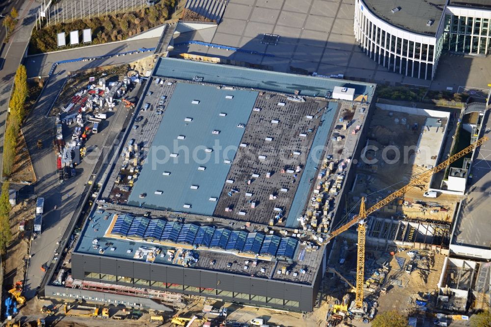 Aerial image Berlin - View of construction site at the exhibition venue Cube City Exhibition Grounds in Berlin Charlottenburg. On the site of the demolished Germany Hall is to be completed by the end of 2013, designed by the architectural firm UNIQUE CODE suitable congress hall