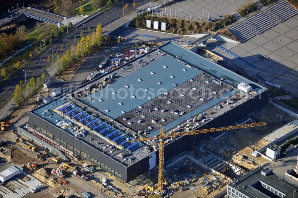 Aerial photograph Berlin - View of construction site at the exhibition venue Cube City Exhibition Grounds in Berlin Charlottenburg. On the site of the demolished Germany Hall is to be completed by the end of 2013, designed by the architectural firm UNIQUE CODE suitable congress hall