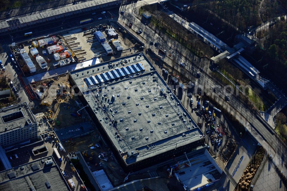 Aerial photograph Berlin - View of construction site at the exhibition venue Cube City Exhibition Grounds in Berlin Charlottenburg. On the site of the demolished Germany Hall is to be completed by the end of 2013, designed by the architectural firm UNIQUE CODE suitable congress hall