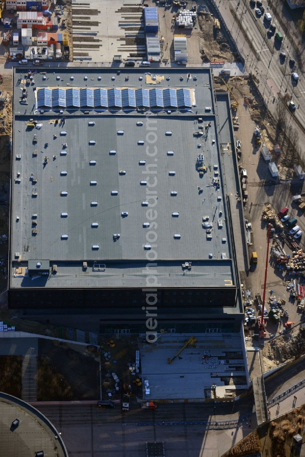 Berlin from above - View of construction site at the exhibition venue Cube City Exhibition Grounds in Berlin Charlottenburg. On the site of the demolished Germany Hall is designed by the architectural firm UNIQUE CODE suitable congress hall