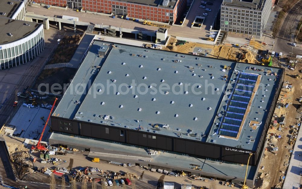 Aerial photograph Berlin - View of construction site at the exhibition venue Cube City Exhibition Grounds in Berlin Charlottenburg. On the site of the demolished Germany Hall is designed by the architectural firm UNIQUE CODE suitable congress hall