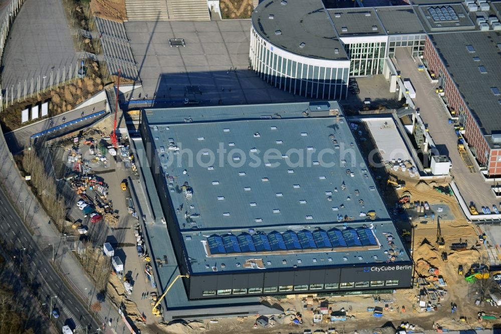 Berlin from above - View of construction site at the exhibition venue Cube City Exhibition Grounds in Berlin Charlottenburg. On the site of the demolished Germany Hall is designed by the architectural firm UNIQUE CODE suitable congress hall