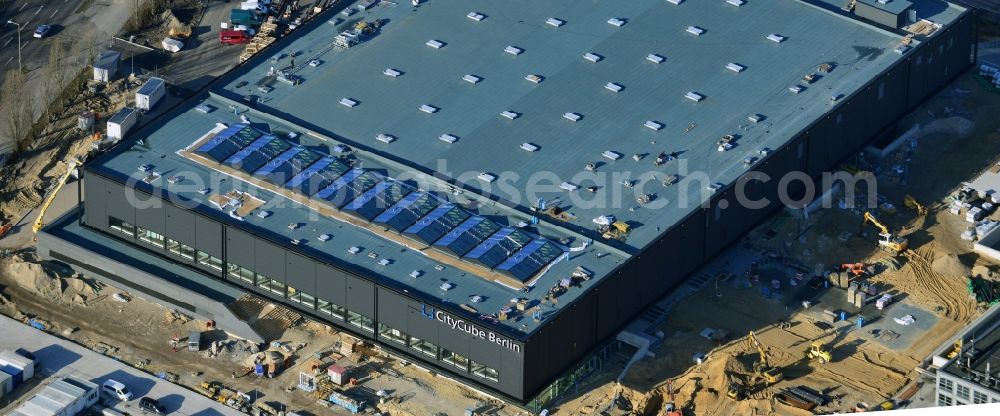 Aerial image Berlin - View of construction site at the exhibition venue Cube City Exhibition Grounds in Berlin Charlottenburg. On the site of the demolished Germany Hall is designed by the architectural firm UNIQUE CODE suitable congress hall