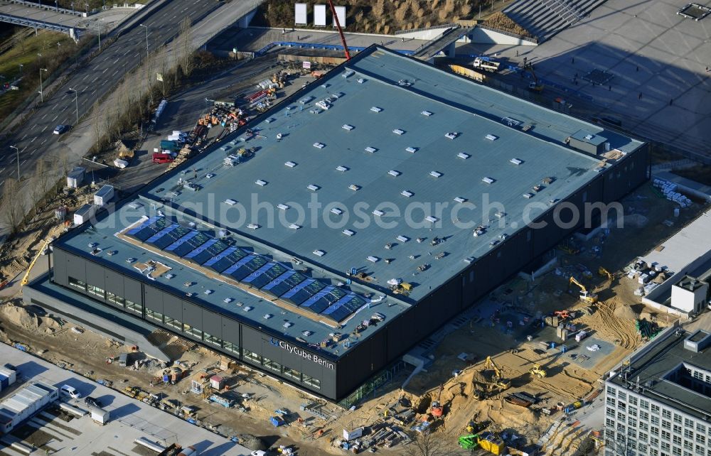 Aerial photograph Berlin - View of construction site at the exhibition venue Cube City Exhibition Grounds in Berlin Charlottenburg. On the site of the demolished Germany Hall is designed by the architectural firm UNIQUE CODE suitable congress hall