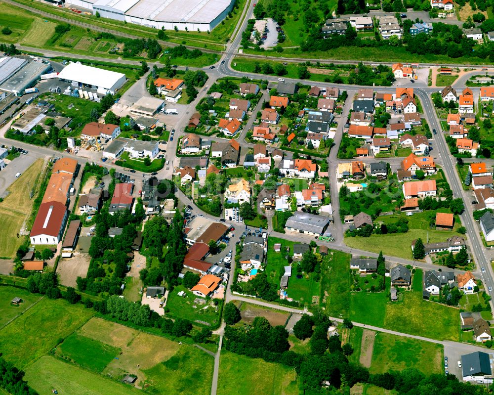 Altingen from the bird's eye view: Residential area construction site of a mixed development with multi-family houses and single-family houses- New building at the in Altingen in the state Baden-Wuerttemberg, Germany