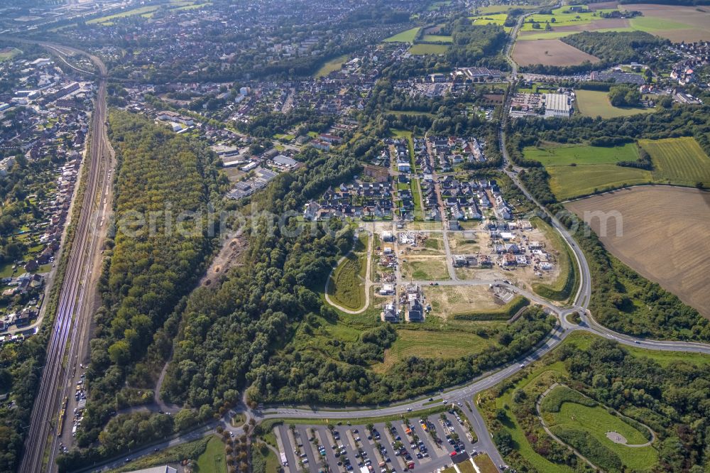 Hamm from above - Residential construction site of a mixed development with multi-family houses and single-family houses- new building Heimshof Ost on the Sachsenring in the district Heessen in Hamm in the Ruhr area in the state North Rhine-Westphalia, Germany