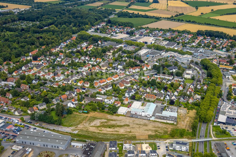 Soest from the bird's eye view: Residential area construction site of a mixed development with multi-family houses and single-family houses- New building at the Merkurhoefe in Soest in the state North Rhine-Westphalia, Germany