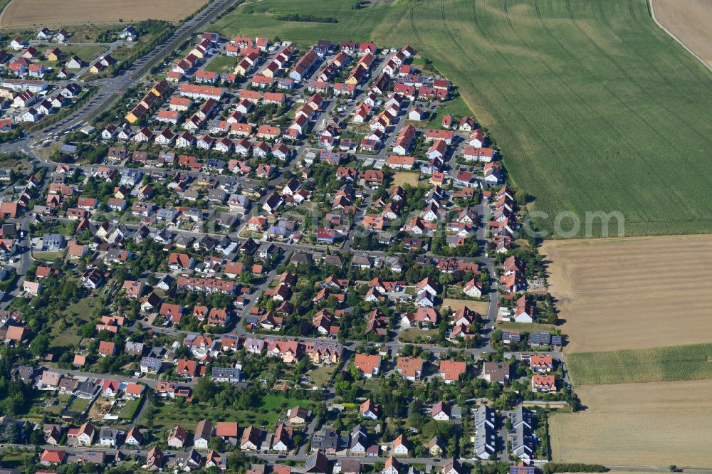 Rottenbauer from the bird's eye view: Residential area construction site of a mixed development with multi-family houses and single-family houses- New building at the in Rottenbauer in the state Bavaria, Germany