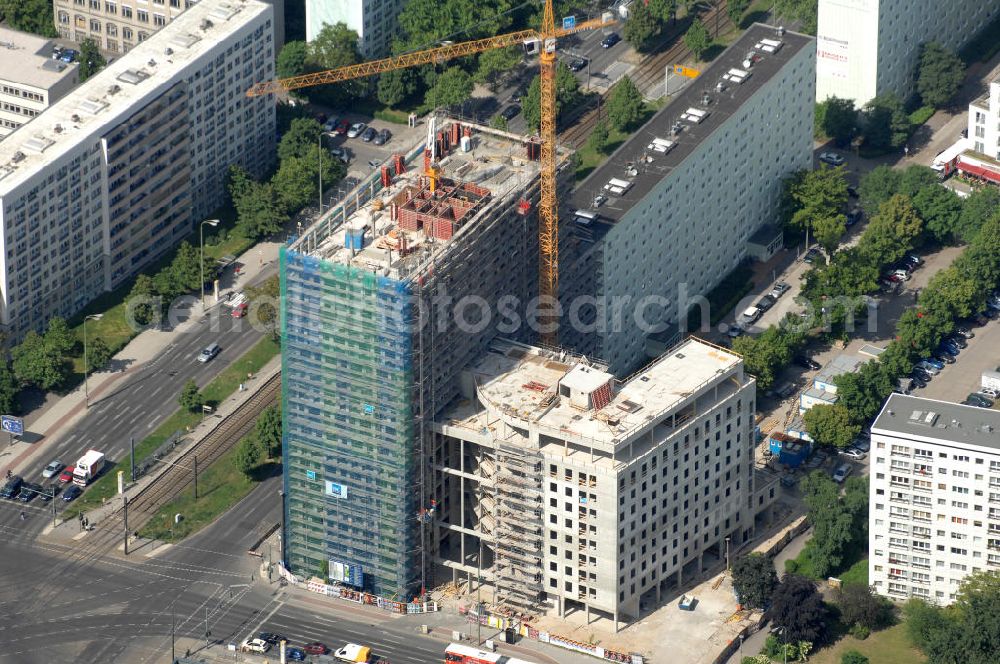 Berlin from the bird's eye view: Blick auf die Baustelle Mollstraße 31 Ecke Otto-Braun-Straße für das neue Wohn- und Geschäftshaus mit dem Namen Königstadt-Carree. Führendes Bauunternehmen ist die DIW Bau GmbH. Kontakt: http://