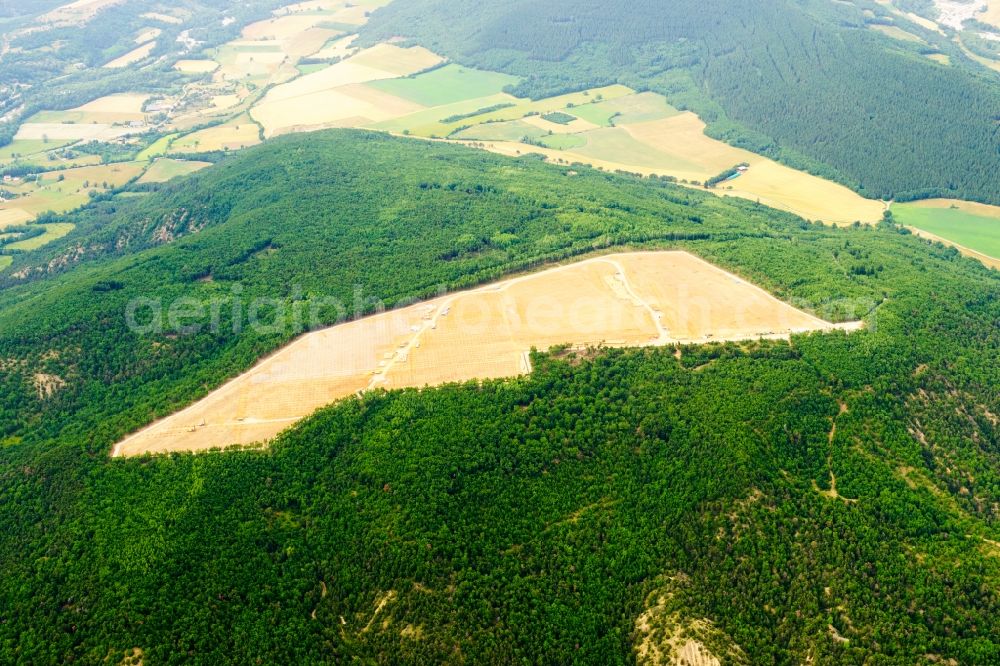 La Bâtie-Montsaléon from the bird's eye view: Construction site and assembly work for solar park and solar power plant in La Batie-Montsaleon in Provence-Alpes-Cote d'Azur, France