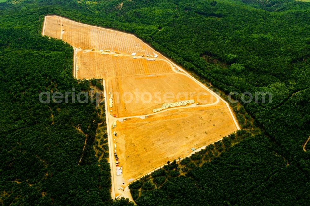 Aerial photograph La Bâtie-Montsaléon - Construction site and assembly work for solar park and solar power plant in La Batie-Montsaleon in Provence-Alpes-Cote d'Azur, France