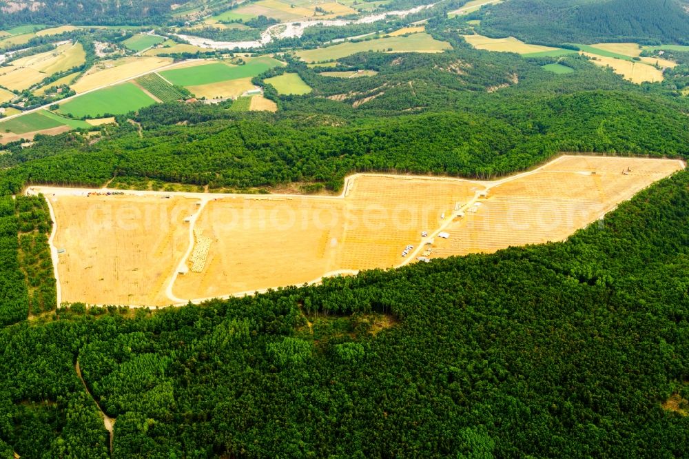 Aerial image La Bâtie-Montsaléon - Construction site and assembly work for solar park and solar power plant in La Batie-Montsaleon in Provence-Alpes-Cote d'Azur, France