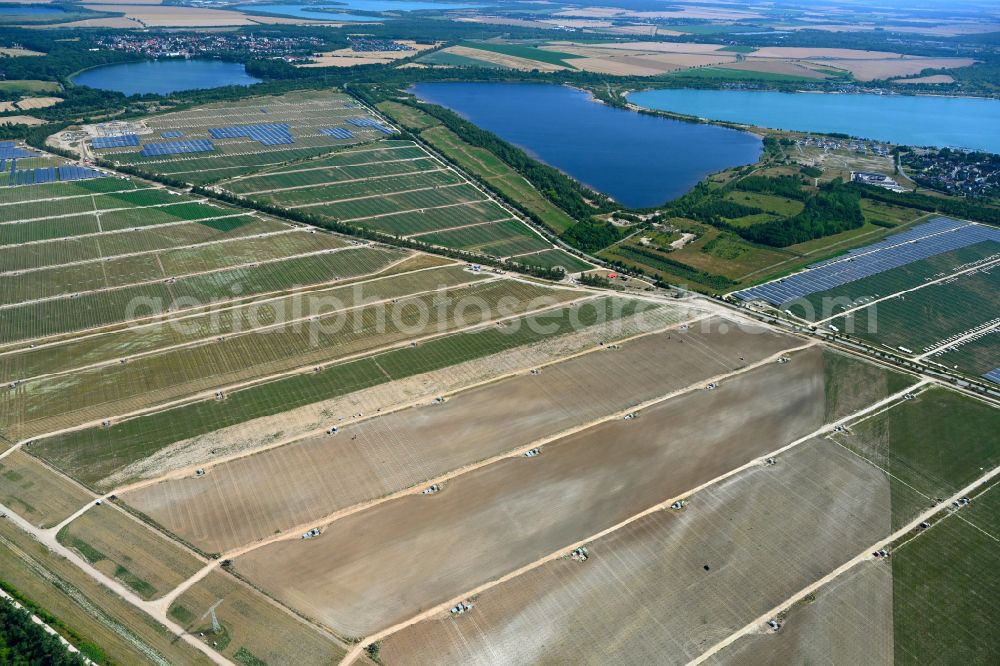 Neukieritzsch from the bird's eye view: Construction site and assembly work for solar park and solar power plant in Neukieritzsch in the state Saxony, Germany