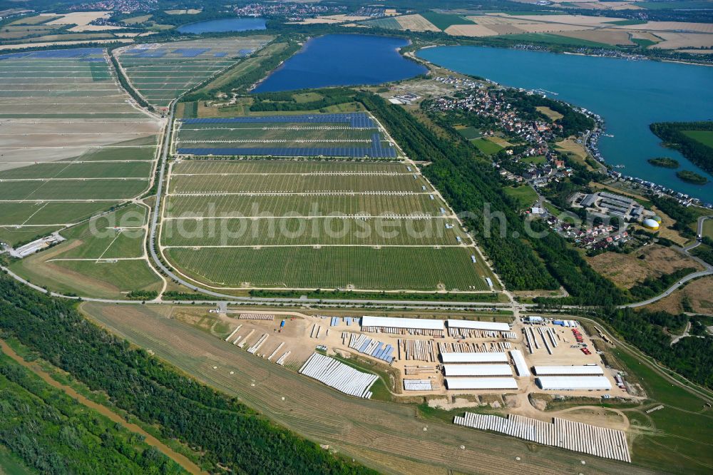 Aerial photograph Neukieritzsch - Construction site and assembly work for solar park and solar power plant in Neukieritzsch in the state Saxony, Germany