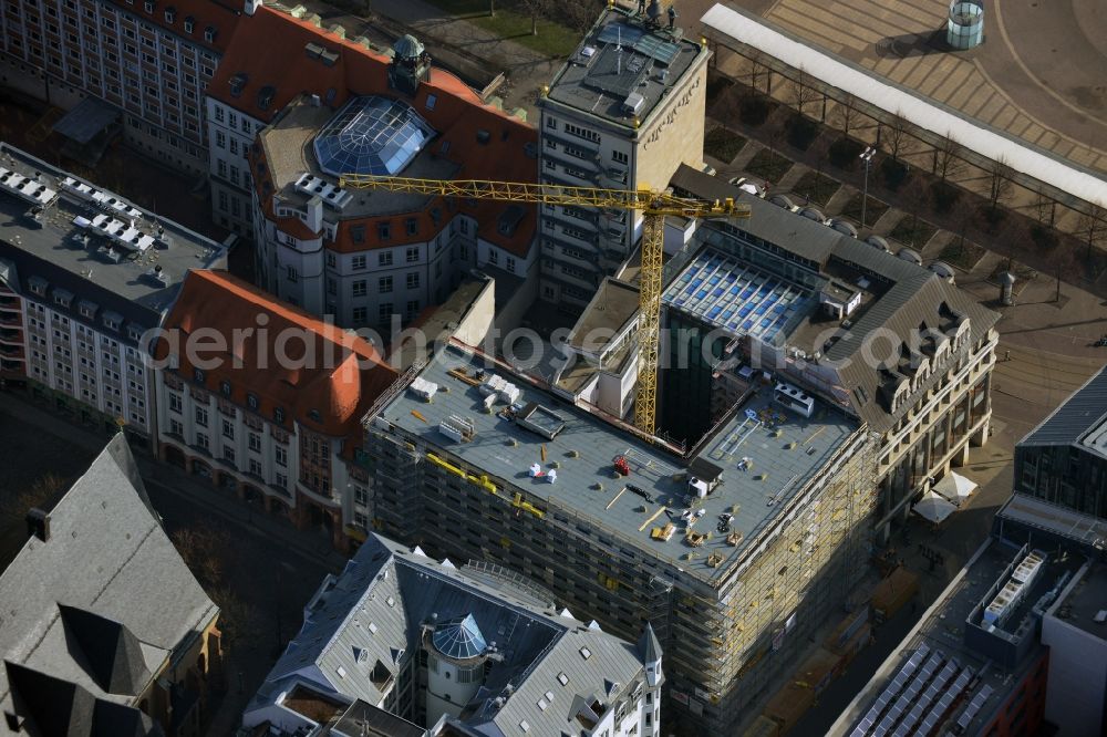 Aerial image Leipzig - At the corner of Ritter Street - Grimmaische Street in Leipzig in Saxony is currently being created, the Motel One Leipzig Augustus place. The completion of the new hotel building is planned for this summer. Prime contractor is the GP Papenburg construction GmbH. As a major client TLG Immobilien GmbH acts. The hotel being built on the back of the Krochhochhaus, a striking sight on Augustus Square