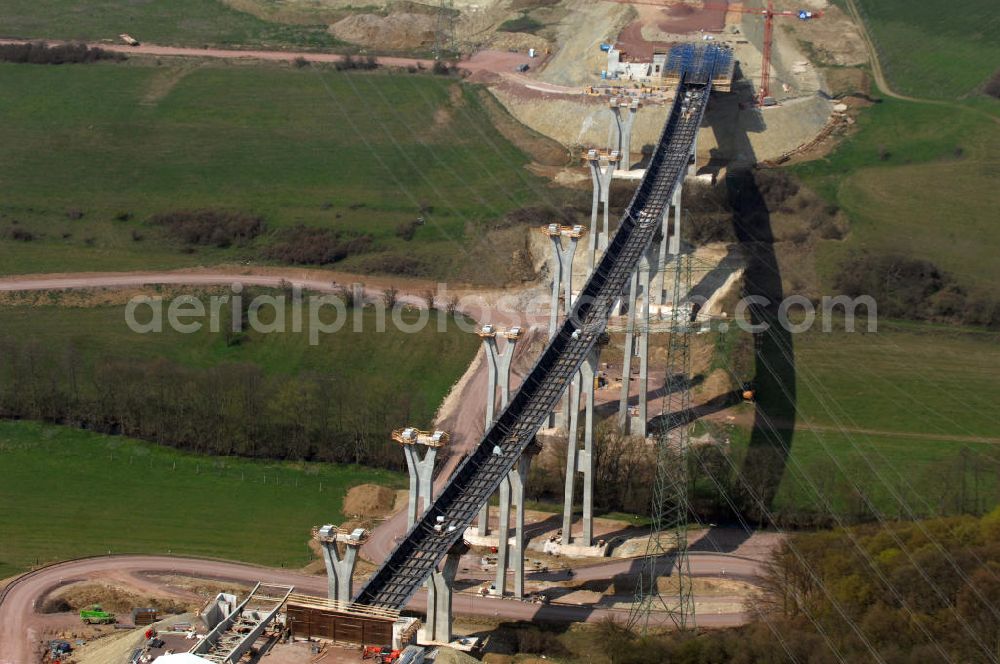 Aerial photograph Ettenhausen - Blick auf die Baustelle der neuen Nessetalbrücke mit einer Länge von 380 m. Die Brücke ist Teil des Projekt Nordverlegung / Umfahrung Hörselberge der Autobahn E40 / A4 in Thüringen bei Eisenach. Durchgeführt werden die im Zuge dieses Projektes notwendigen Arbeiten unter an derem von den Mitarbeitern der Niederlassung Weimar der EUROVIA Verkehrsbau Union sowie der Niederlassungen Abbruch und Erdbau, Betonstraßenbau, Ingenieurbau und TECO Schallschutz der EUROVIA Beton sowie der DEGE??